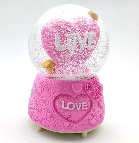 Γυάλινη Χιονόμπαλα με Καρδιά σε Σχήμα Τριαντάφυλλου με Βέλος Love 12×14.5cm Γυάλινη Χιονόμπαλα με Καρδιά σε Σχήμα Τριαντάφυλλου με Βέλος Love 12×14.5cm