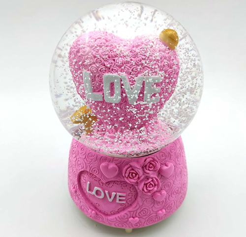 Γυάλινη Χιονόμπαλα με Καρδιά σε Σχήμα Τριαντάφυλλου με Βέλος Love 12×14.5cm Γυάλινη Χιονόμπαλα με Καρδιά σε Σχήμα Τριαντάφυλλου με Βέλος Love 12×14.5cm