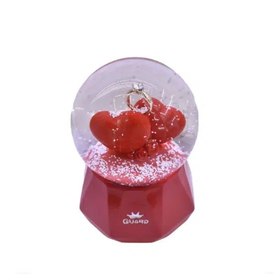 Γυάλινη Xιονόμπαλα με Καρδιές Δαχτυλίδι & Μουσική 9x6cm Γυάλινη Xιονόμπαλα με Καρδιές Δαχτυλίδι & Μουσική 9x6cm