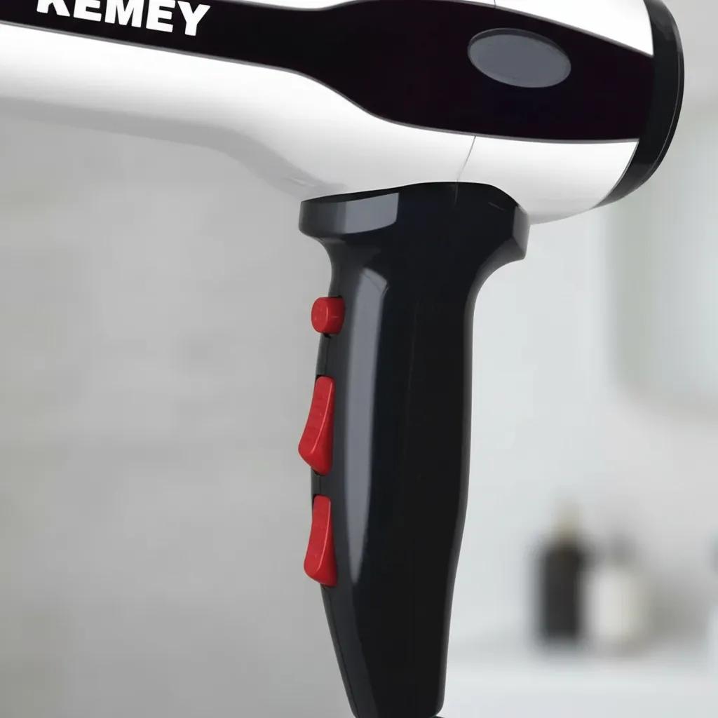 KEMEI Επαγγελματικό Πιστολάκι Μαλλιών 2000W με Λειτουργία Thermoprotect Λευκό/Μαύρο KEMEI Επαγγελματικό Πιστολάκι Μαλλιών 2000W με Λειτουργία Thermoprotect Λευκό/Μαύρο