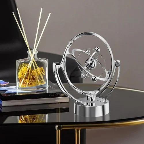 Περιστρεφόμενο Μαγνητικό Διακοσμητικό Κίνησης Μεταλλικό Ασημί – Αέναη Κίνηση Περιστρεφόμενο Μαγνητικό Διακοσμητικό Κίνησης Μεταλλικό Ασημί – Αέναη Κίνηση