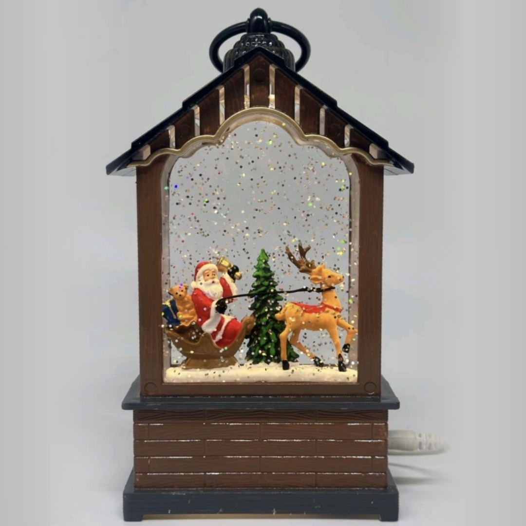 Χριστουγεννιάτικo Φωτιζόμενο Φανάρι - Σπιτάκι Με Άγιο Βασίλη Και Τάρανδο 21 cm Χριστουγεννιάτικo Φωτιζόμενο Φανάρι - Σπιτάκι Με Άγιο Βασίλη Και Τάρανδο 21 cm